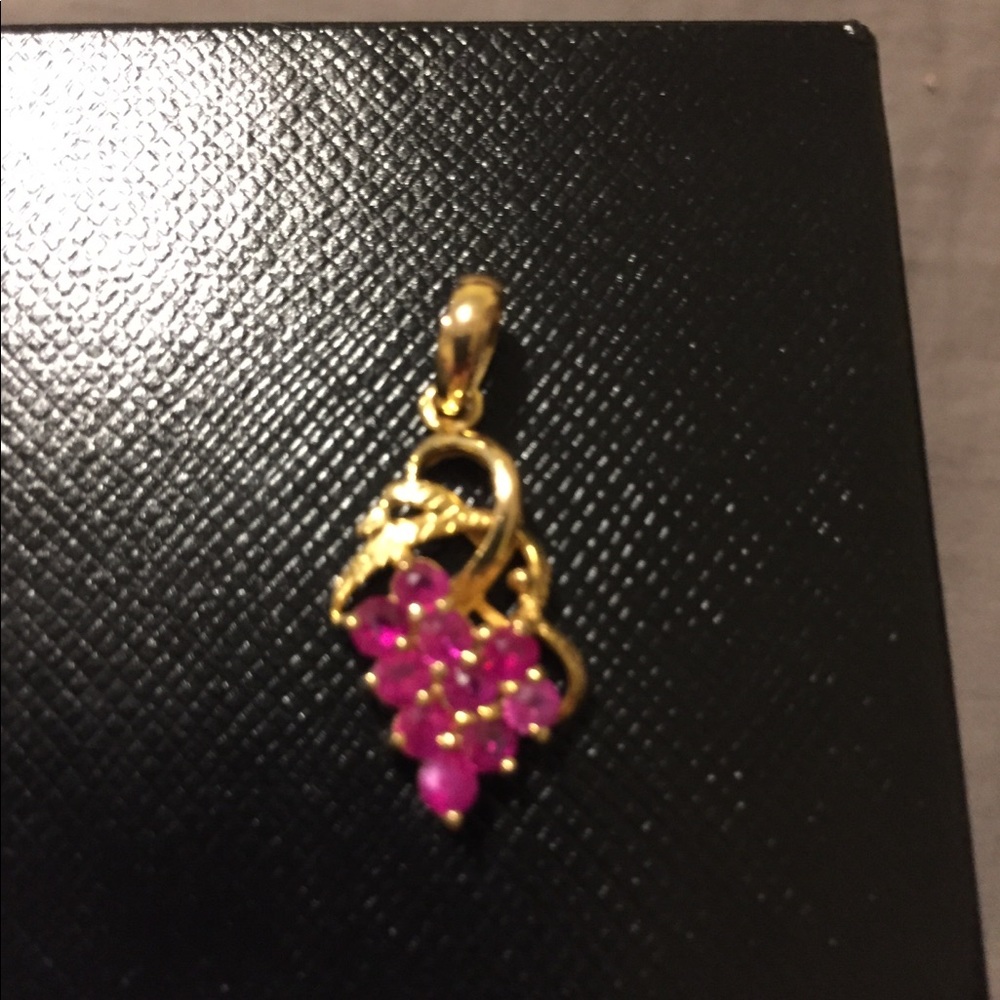 Real gold 10k and natural ruby.Long 2.4cm.Like new